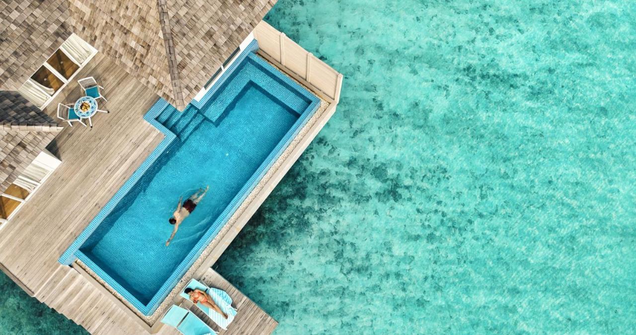 Kandima Maldives Kudahuvadhoo ภายนอก รูปภาพ Aerial view of a pool at a resort in Maldives